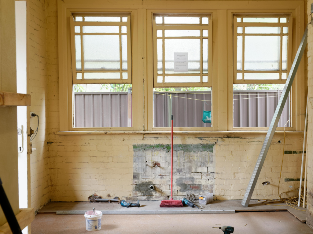 Interior renovation showing exposed structural repairs illustrating why cosmetic improvements alone do not create real estate value